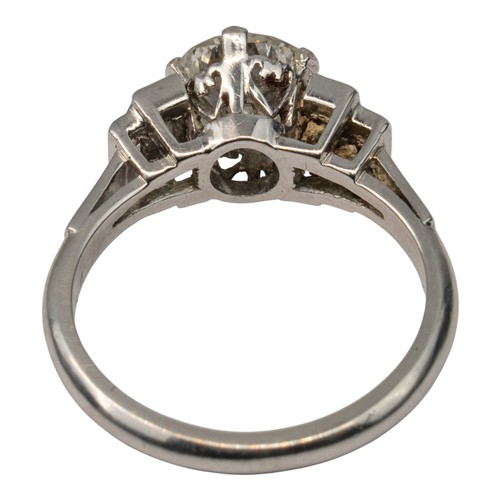 86 - Art DecoA brilliant-cut diamond and baguette diamond ring. The circular central stone weighing appro... 