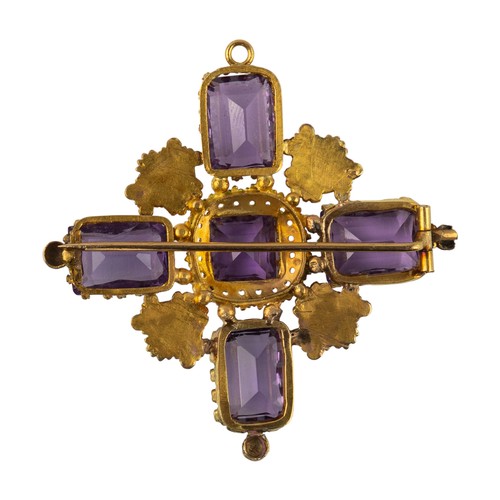 90 - British, RegencyAn amethyst and three-coloured gold cross pendant/brooch, circa 1825Set with four sq... 