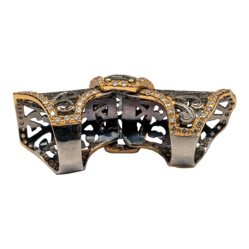 87 - Grimoldi, MilanoA Meccanico Rock 18k black and rose gold and diamond ring. With 3.5 cts of diamonds.... 