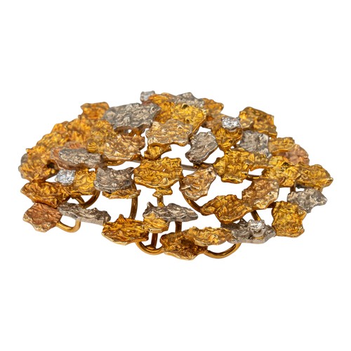82 - Alan Martin Gard, 1969A molten three-coloured gold abstract brooch/pendant, set with four brilliant-... 