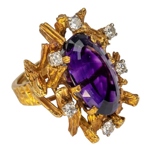 92 - Alan Martin Gard, circa 1970A fine Siberian amethyst 18k gold and diamond ring. The oval-shaped mixe... 