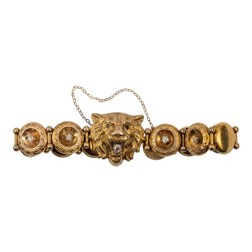 94 - Early 20th centuryA gold and diamond lion's head bracelet, circa 1900. The front set with a lion's m... 