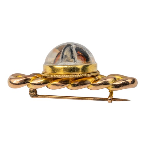 93 - Victorian, Essex crystal broochThe oval cabochon crystal painted with the head and shoulders of a wh... 