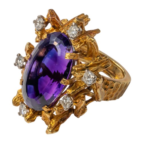 92 - Alan Martin Gard, circa 1970A fine Siberian amethyst 18k gold and diamond ring. The oval-shaped mixe... 