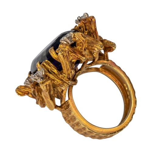92 - Alan Martin Gard, circa 1970A fine Siberian amethyst 18k gold and diamond ring. The oval-shaped mixe... 