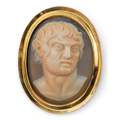 96 - 17th centuryA large agate cameo of a young manSet in a modern 18k gold setting. The cameo measuring ... 