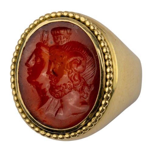 104 - Romano-Egyptian, 1st centuryA Zeus Ammon and Isis carnelian intaglio dress ring. Set in a later heav... 