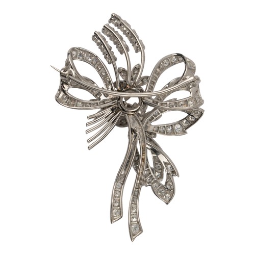 103 - A platinum and diamond spray brooch, circa 1950The spray of flowers tied with a diamond-set bowDimen... 