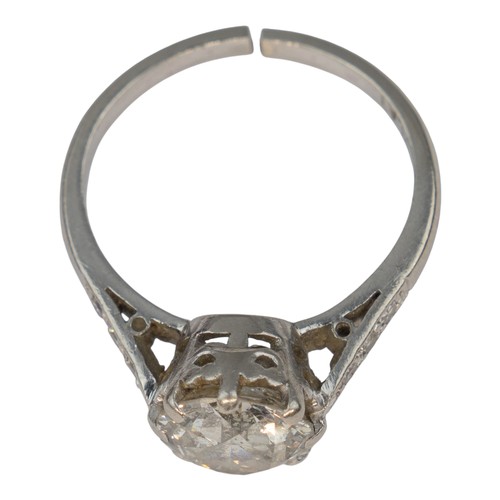 117 - An old-cut diamond, claw-set in a coronet platinum mountWith small diamond shoulders. The central st... 