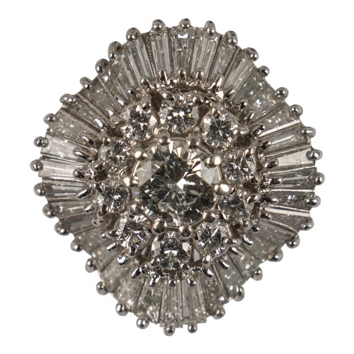 114 - A fine diamond-set dress ring, circa 1950sSet to the centre with a single brilliant-cut diamond, wit... 