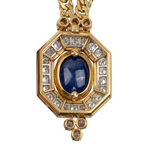 118 - French, circa 1980An impressive sapphire and diamond pendant necklace and matching earrings. The pen... 