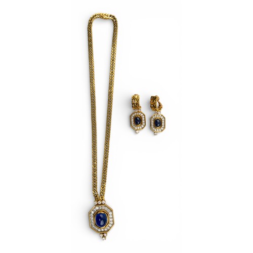 118 - French, circa 1980An impressive sapphire and diamond pendant necklace and matching earrings. The pen... 
