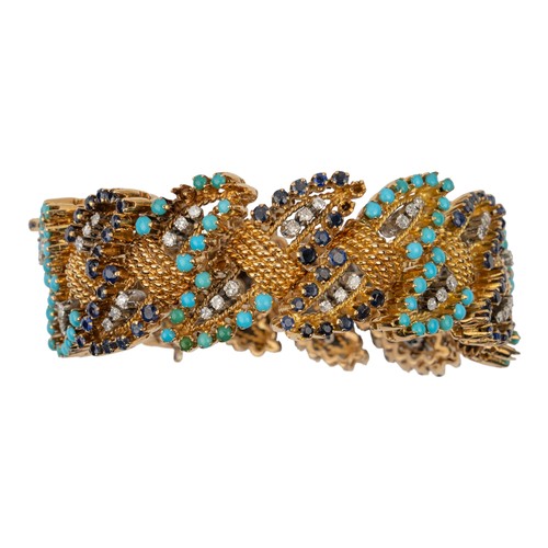 112 - An unusual gold and gem-set bracelet, circa 1960Composed of leaf-shaped links, with wire-twist conne... 