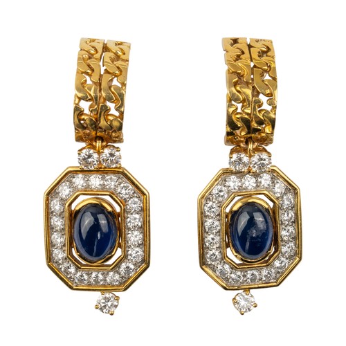 118 - French, circa 1980An impressive sapphire and diamond pendant necklace and matching earrings. The pen... 