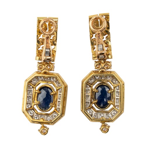 118 - French, circa 1980An impressive sapphire and diamond pendant necklace and matching earrings. The pen... 
