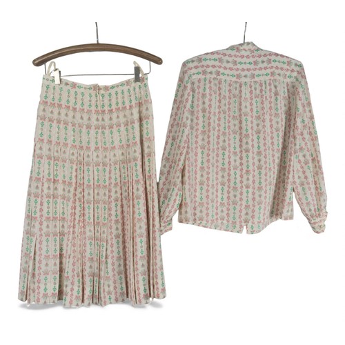 147 - A vintage 1970s Celine ensembleConsisting of a cream silk skirt and matching shirt, with pink and gr... 