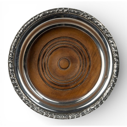 154 - George VIA silver wine coaster, with vine decoration to the border. Hallmarked Birmingham, 1937. Wit... 