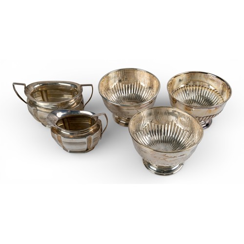 168 - Edwardian, A group of five silver items[a] Three Fenton Brothers Ltd silver footed bowls. Hallmarked... 