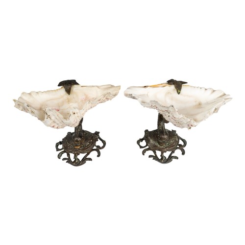 175 - AntiqueA pair of clamshell compotes, supported by a bronze carpDimensions:8 in. (H) x 8 in. (W)... 