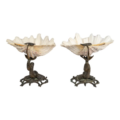 175 - AntiqueA pair of clamshell compotes, supported by a bronze carpDimensions:8 in. (H) x 8 in. (W)... 