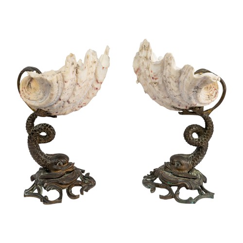 175 - AntiqueA pair of clamshell compotes, supported by a bronze carpDimensions:8 in. (H) x 8 in. (W)... 