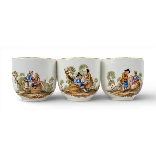 300 - An 18th century Meissen chocolate and tea setFeaturing a chocolate pot, seven cups of two differing ... 