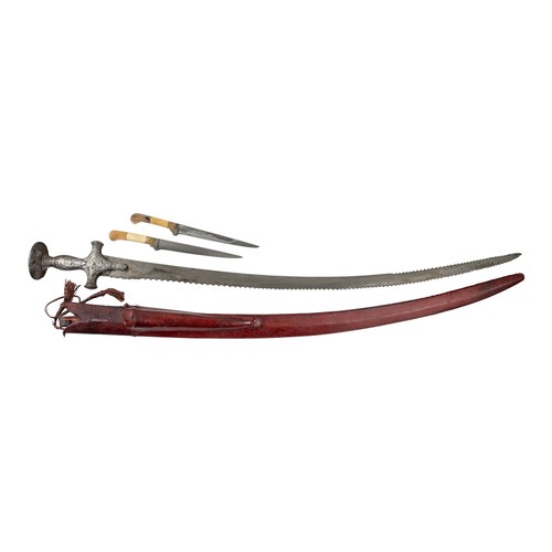 Indian, 19th centuryA Talwar with two smaller daggers in a red leather ...