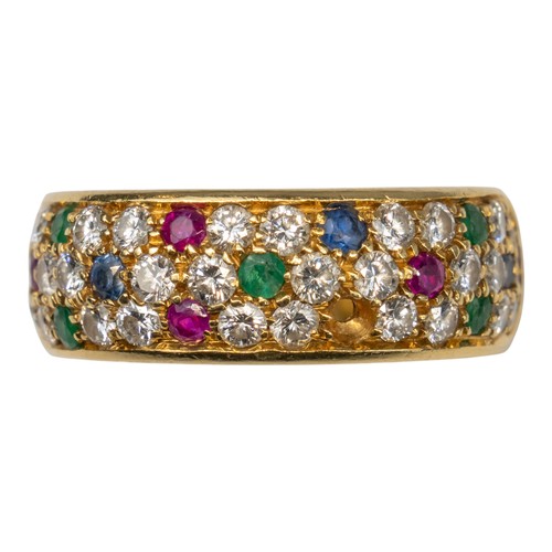 77 - A diamond, ruby, emerald and sapphire pave-set band ring, circa 1980The top designed as five small f... 
