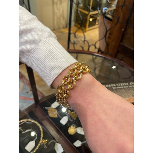 97 - An 18k gold figure-of-eight-link bracelet, circa 1950sTotal length: Approx. 21.5 cm.Total weight: Ap... 