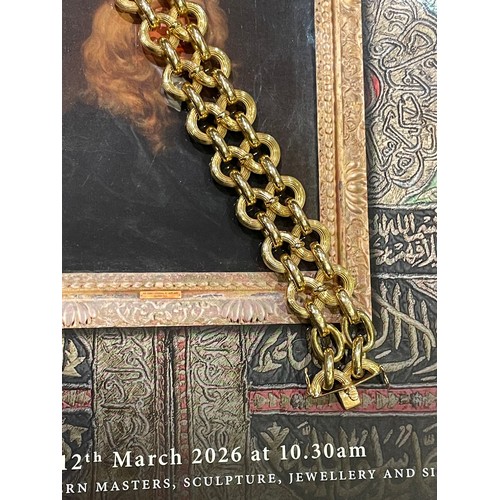 97 - An 18k gold figure-of-eight-link bracelet, circa 1950sTotal length: Approx. 21.5 cm.Total weight: Ap... 