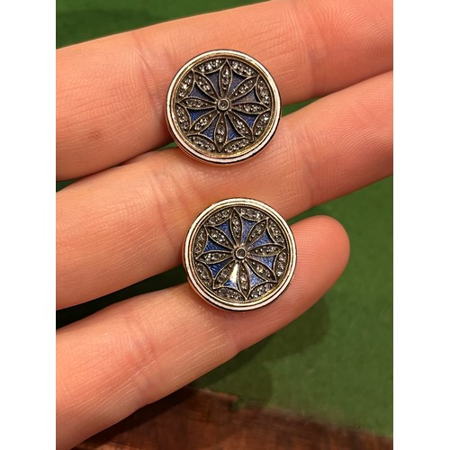 66 - A pair of rose-coloured gold enamel and diamond cufflinks, probably Russian.The circular tops with p... 
