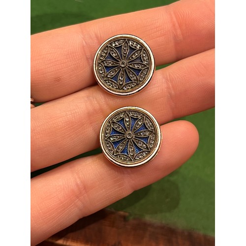 66 - A pair of rose-coloured gold enamel and diamond cufflinks, probably Russian.The circular tops with p... 
