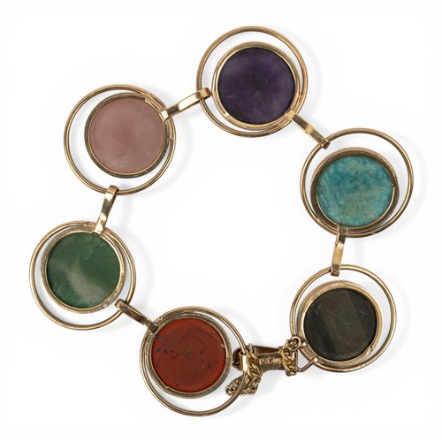 1 - Circa 1960s, A 9ct gold and multi gem-set cabochon braceletComposed of six various cabochon, includi... 