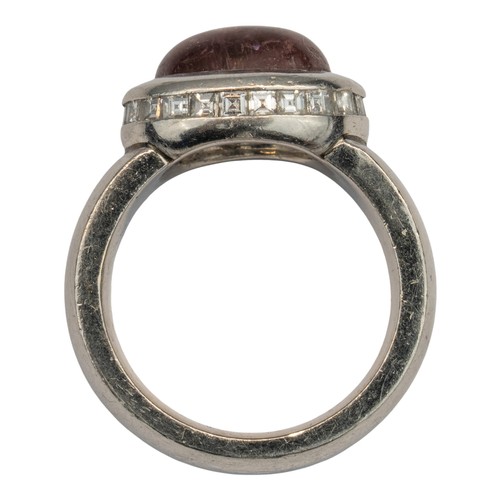 8 - H&uuml;lse, A platinum, diamond and tourmaline dress ringThe cabochon red tourmaline with a surround... 