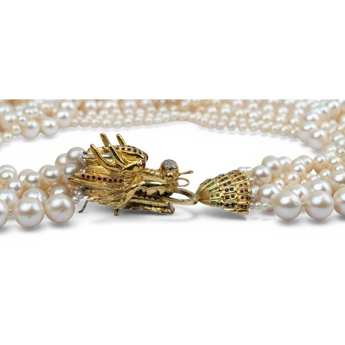 9 - A striking 14ct gold and diamond and gem-set dragon pearl necklaceComposed of seven rows of cultured... 