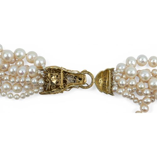 9 - A striking 14ct gold and diamond and gem-set dragon pearl necklaceComposed of seven rows of cultured... 