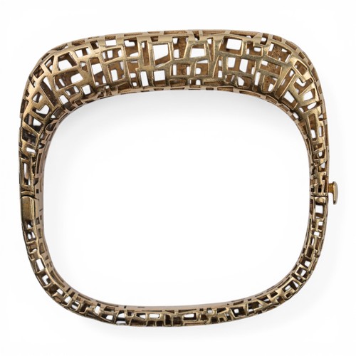 20 - Roberto CoinA silver gilt abstract bangle, circa 1970s. Of futuristic architectural style.Signed and... 