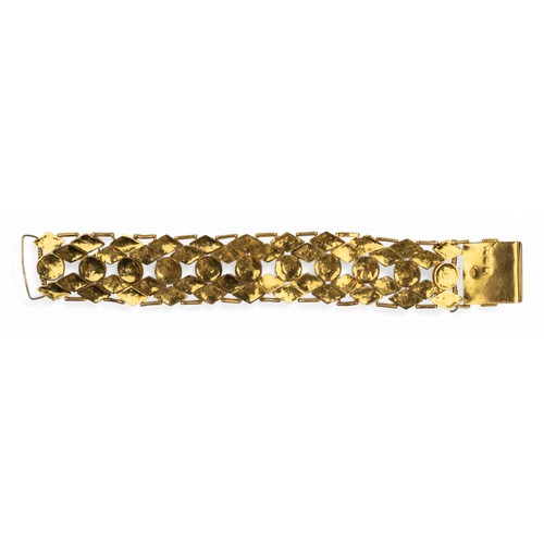 27 - Eastern, circa 1950A high-carat fancy-link gold bracelet, with Arabic hallmarks. The highly flexible... 