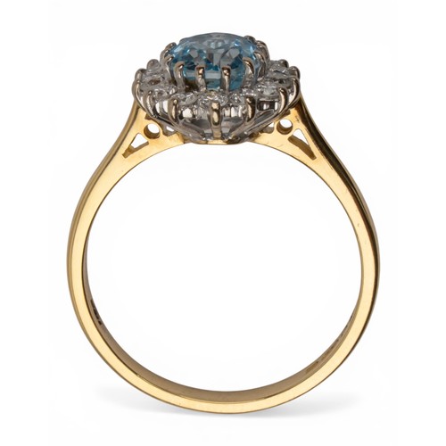 41 - An aquamarine and diamond cluster ring, circa 1980sThe oval-shaped mixed-cut aquamarine of pretty co... 
