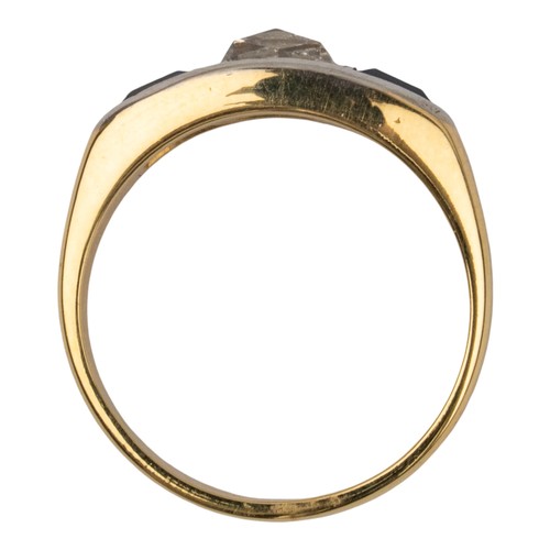 45 - Continental1960sA rose cut diamond and synthetic sapphire three stone ringMounted in 18 carat yellow... 