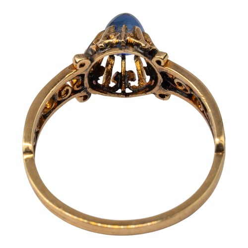 53 - An antique cabochon sapphire and rose gold ring, circa 1880The antique ring set to the centre with a... 