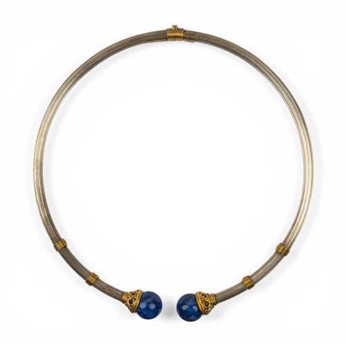 49 - Ilias LalaounisA silver and gold torque necklaceSigned and numbered 121-925With original red suede p... 