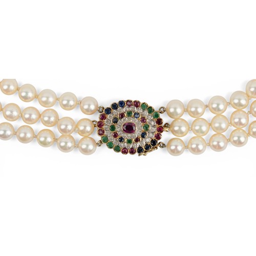59 - A three-row cultured pearl, diamond and gem-set choker necklaceThe slightly graduated pearls of good... 
