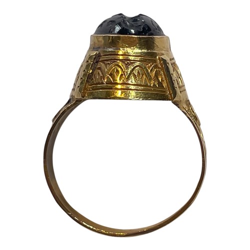 3A - Antique, A high-carat gold and garnet intaglio ring, in the Persian styleThe intaglio engraved with ... 