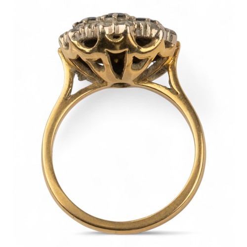 3 - Circa 1970A sapphire and diamond cluster ring. Mounted in 18k white and yellow goldFinger size: MTot... 