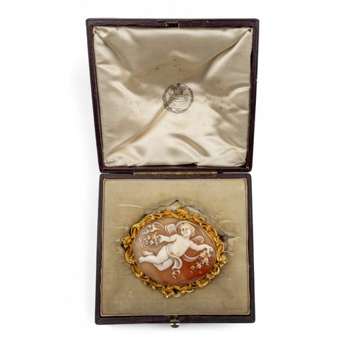 10 - Victorian, A shell cameo gold-mounted brooch, circa 1840The oval-shaped shell cameo depicting a wing... 