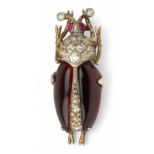 11 - VictorianAn unusual diamond and garnet bug broochThe two wings formed with bright red cabochon garne... 