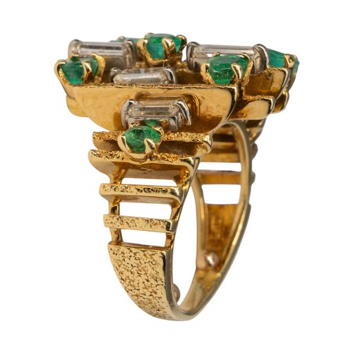 16 - Alan Gard style, 1970sAn abstract emerald and diamond dress ring, mounted in 18k yellow gold. Set th... 