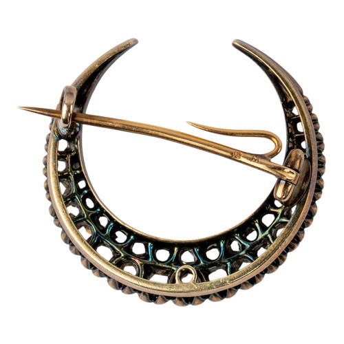 19 - Antique, A rose-cut diamond double crescent brooch, circa 1880Mounted in silver and goldTotal width:... 