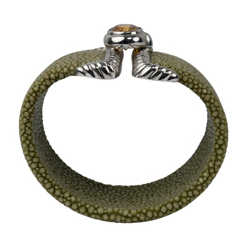 20 - A striking citrine and stingray cuffSet to the centre with a mixed-cut citrine in a buckle design, w... 